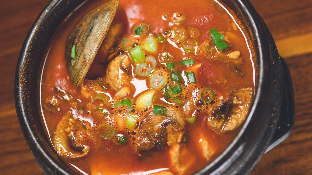Soondubu Chigae 순두부찌개 · Spicy and savory stew with silken tofu and seafood (mussels, shrimp, squid and clams). Served with your choice of white rice or Dokebi Purple (mixed grain) rice. Complimentary egg upon request.