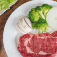 Diy Ribeye Steak (Uncooked) · Uncooked choice-angus ribeye with extra virgin olive oil, salt + pepper, broccoli, onions, m...