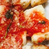 Bruschetta Alla Romano · Warm toasted Italian garlic bread topped with melted mozzarella cheese and Diamond’s famous ...