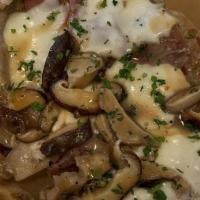 Veal Scarmorza · Veal cutlet sauteed with Shitake mushrooms in a Marsala wine sauce & topped with Parma Prosc...