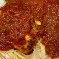 Parmigiana · Chicken or Veal Breaded cutlet topped with melted mozzarella cheese and marinara sauce