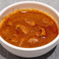 Chicken Curry · Ginger garlic with chicken in an onion and tomato sauce.