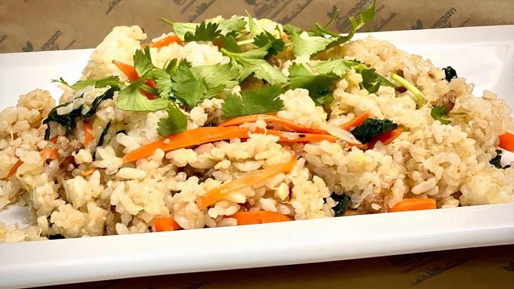 Fried Rice · fried quinoa rice w/ sausage, garlic, onions, kale, carrots and Just Egg w/ green onion garnish