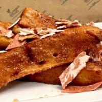 French Toast Sticks · Cinnamon French toast sticks | maple syrup | bakon