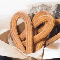 Churro Box · 4 pcs of 4-5 inch long loop-shaped churro with cinnamon sugar.
