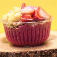 Flamingo Bowl · Organic pitaya, strawberries, mango, banana, apple juice

Topped with strawberries, pineappl...