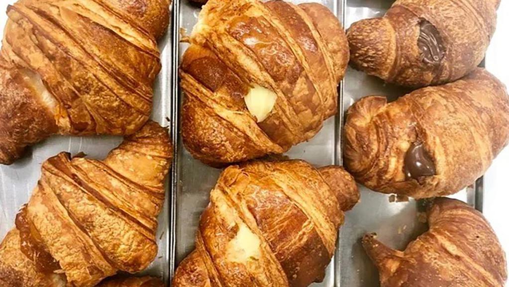 Croissants · Choose from the following: Butter Croissant, Nutella, Custard Cream or Apricot filled.