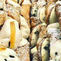 Cannoli Small · Most popular. Crunchy Cannoli Shells filled with ricotta and chocolate chips and topped with...