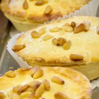 Torta Della Nonna · Lemon curd and pine nuts.