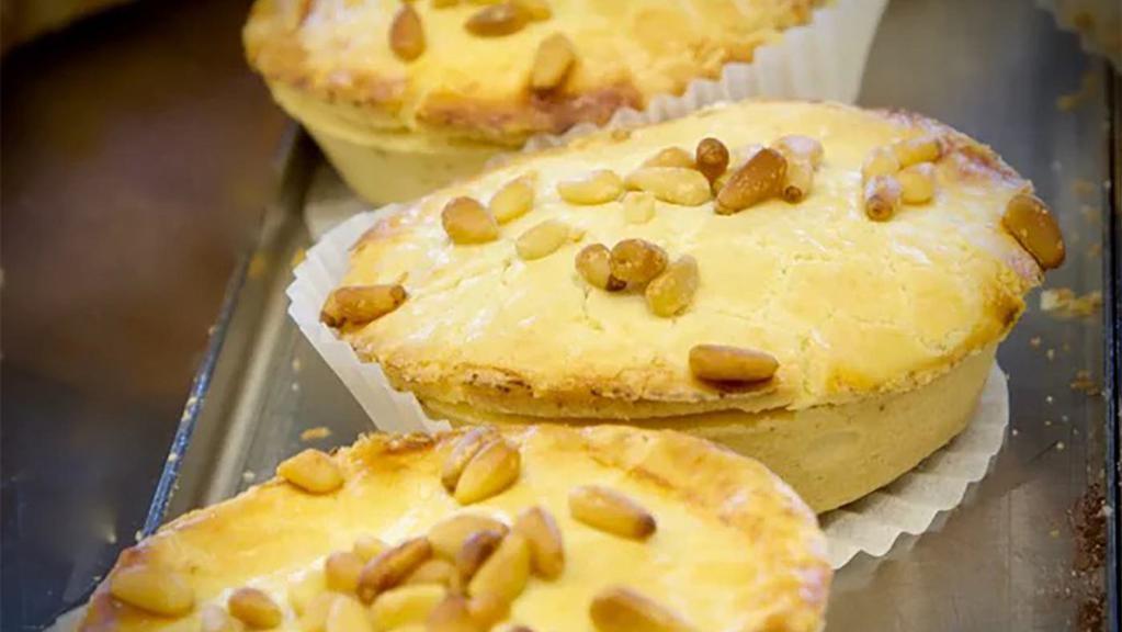 Torta Della Nonna · Lemon curd and pine nuts.