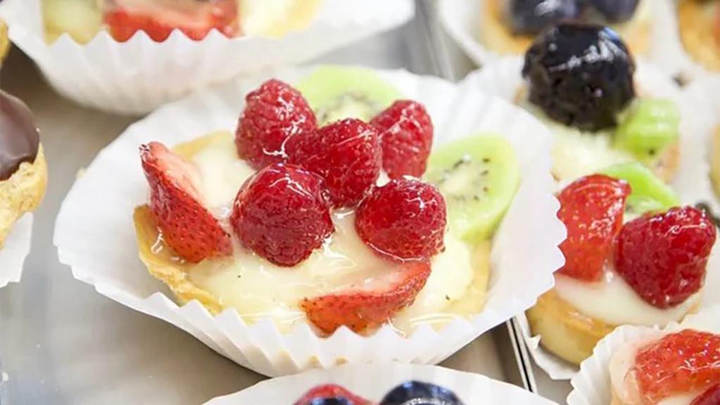 Fruit Tart Small · Shortbread cups filled with custard cream and topped with fresh fruit.