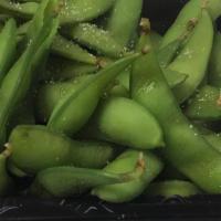Edamame · Steamed young soybeans tossed in sea salt.