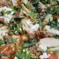 Cauliflower Pizza · Gluten Free cauliflower crust, Fresh Mozzarella, Basil, and Tomato Sauce