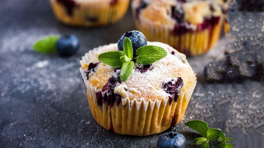 Blueberry Muffin · Moist and crumbly muffin filled with blueberries.