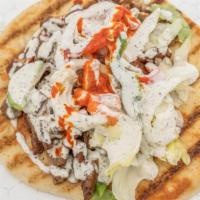 Lamb Gyro · Served with salad and any of shahzad's sauces.