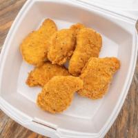 Chicken Nuggets · Six pieces.