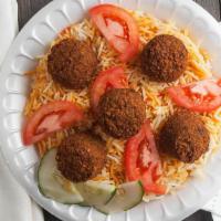 Falafel Over Rice · Add extra meat for an additional charge.