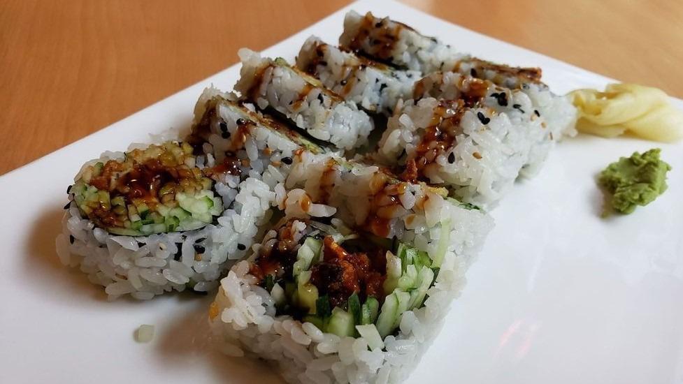 Oyster Tempura Roll · Fried oyster, cucumber, tobiko topped with eel sauce.