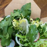Salad · Watercress, fresh herbs, buttermilk and black garlic dressing.