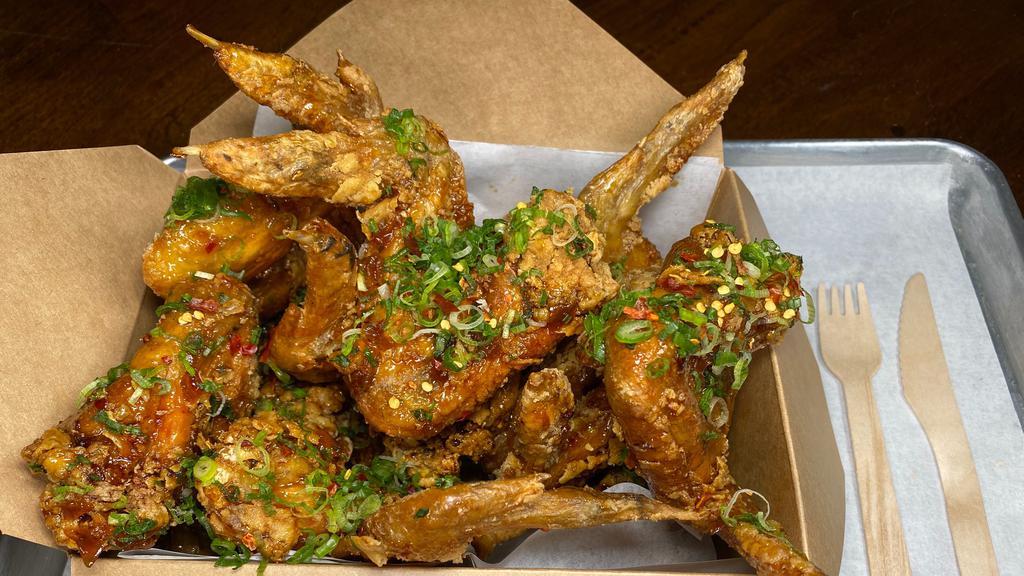 Wangs 25 Pcs · Fried Korean style jumbo wings glazed in choice of Wangs Hot Sauce or Wangs Not Hot Sauce.

Serves 8 to 10 people.
We recommend 3 wings per person.

For orders over 50 wings pleasse call us at 718-636-6390