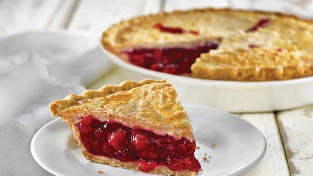 Cherry Pie, Slice · Sweet and tangy cherries baked inside a golden double crust. (580 cal/slice)