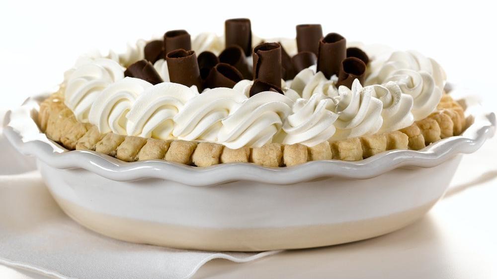 Chocolate French Silk Pie · Creamy chocolate topped with real whipped cream and dark chocolate curls. (760 cal/slice). Serves six or more! .