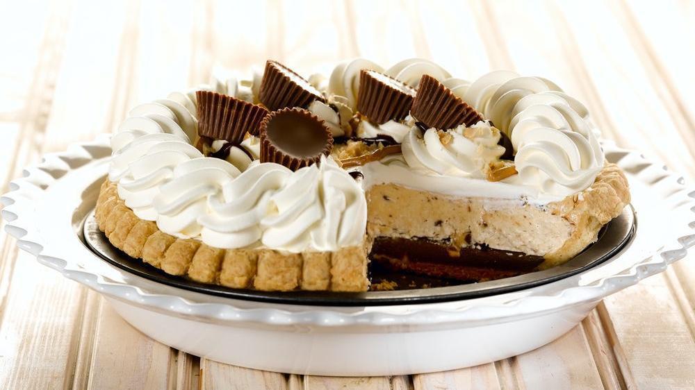 Peanut Butter Silk Pie · Layers of chocolate, peanut butter silk, real whipped cream and mini chocolate peanut butter cups. (930 cal/slice). Serves six or more! .