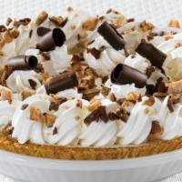 Heath® Crunch Cheesecake Pie · A caramel toffee cheesecake topped with real whipped cream, crushed Heath® bar and chocolate...