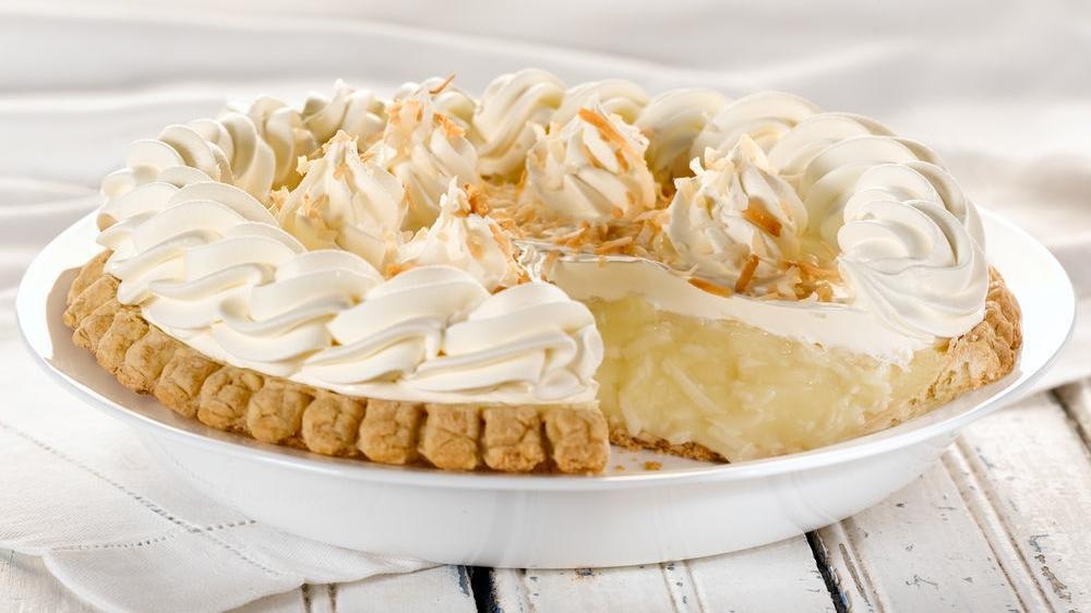 Coconut Cream Pie · Shredded coconut in a vanilla filling, topped with real whipped cream. (640 cal/slice). Serves six or more! .