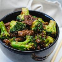 Beef With Broccoli · Served with Egg Roll & Roast Pork Fried Rice.