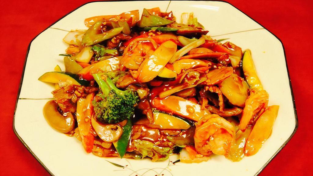 Happy Family · Sauteed w. pork, chicken, beef, shrimp, scallops, and crabmeat w. assorted Chinese mixed vegetables in special brown sauce.