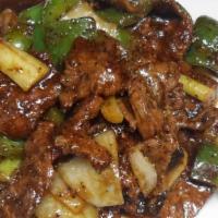 Pepper Steak With Onion · Stir fried steak with vegetables and a savory sauce.