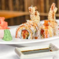 Shinju Roll · Shrimp tempura, spicy tuna, avocado, and topped with spicy crab.