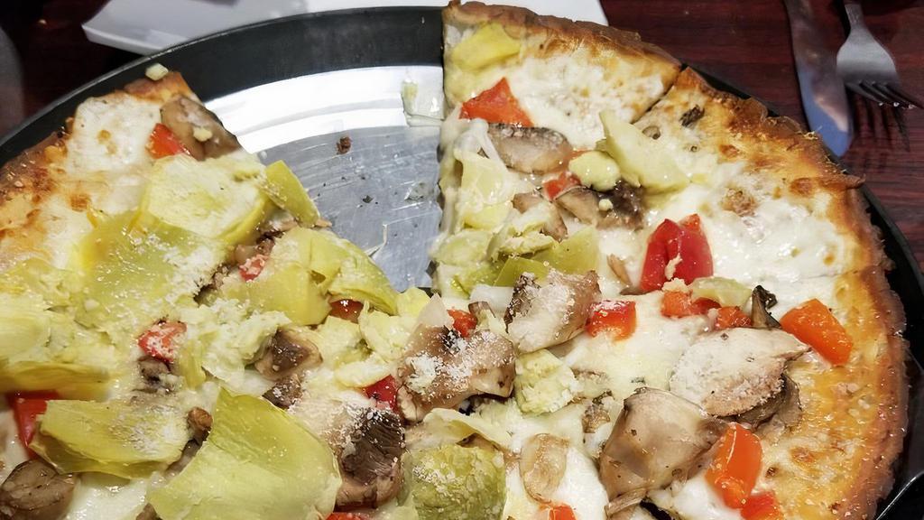Veggie Pizza · Olive oil and garlic sauce, mozzarella, onions peppers, mushrooms and artichoke hearts.
