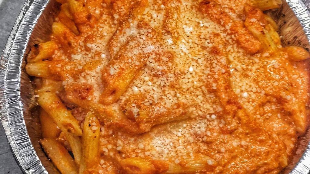 Penne Alla Vodka · Penne pasta baked with our alla vodka sauce topped with parmesan cheese