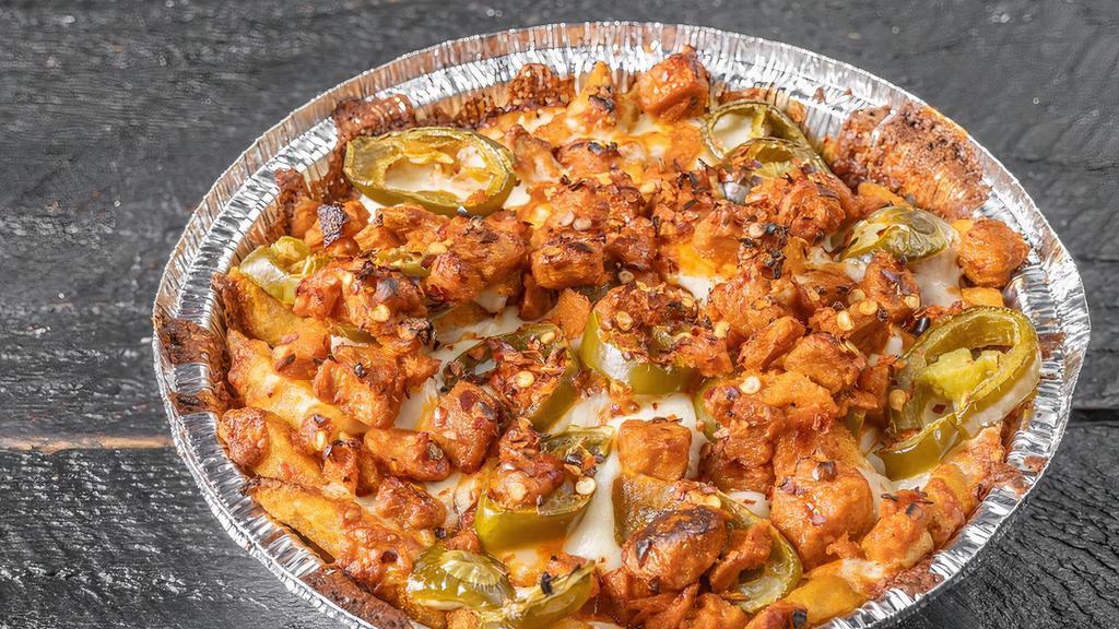 Volcano Fries ( Large)  · Spicy fries, Buffalo Bites, Jalapeño and topped with melted cheese.