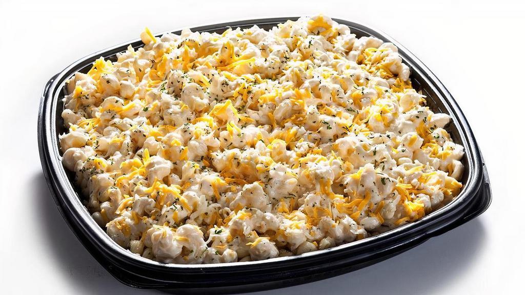 White Cheddar Mac · Creamy, white cheddar pasta topped with cheddar/mozzarella and baked.