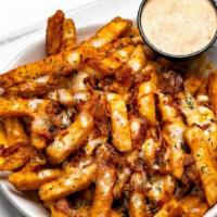 Cheese & Bacon Fries · Natural cut fries, mozzarella, cheddar, applewood smoked bacon, Arooga's Cajun Ranch