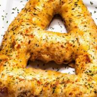 Crab 'A' Pretzel · Scratch-made 'A' pretzel, crab, cream cheese, mozzarella, cheddar, Old Bay