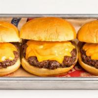 Cheeseburger Sliders · Black Angus burger, American cheese, burger sauce, toasted brioche
