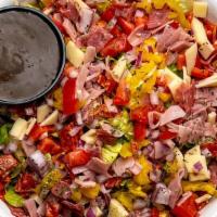 Itallian Chopped Salad · Organic romaine, Genoa Salami, ham, pepperoni, provolone, banana pepper, red onion, Roma tom...