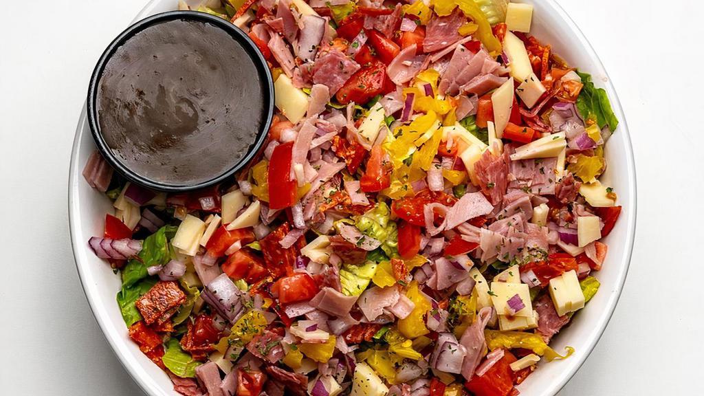 Itallian Chopped Salad · Organic romaine, Genoa Salami, ham, pepperoni, provolone, banana pepper, red onion, Roma tomato, organic balsamic