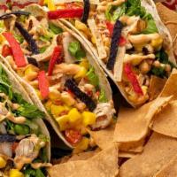 Street Tacos (3): Chicken · No antibiotic ever chicken, tortillas, mango pico, USDA organic romaine, Sriracha aioli, fre...