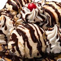 Cookie Pizza · Half-baked chocolate chip cookie, Arooga's vanilla bean ice cream, Hershey's chocolate sauce...