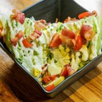 Iceberg Wedge Salad · Bacon, egg, tomato, ranch, and chive.