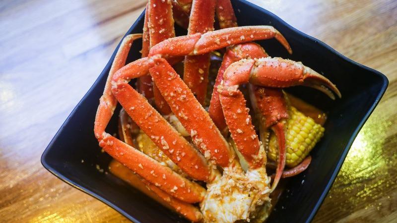 Snow Crab Legs · Per pound. Your seafood is boiled in our Cajun-style seasoning, tossed with your choice of signature sauce. Served with corn, potato, sauce, and rice cake. All served in FDA and USDA approved bags to lock in all the flavor!.