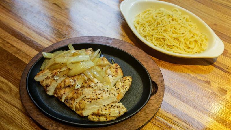 Grilled Chicken Steak · Free-ranged chicken breast and sauteed onions.