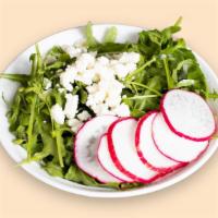 Rocket Salad · Arugula, lemon, tomatoes, and onions drizzled with olive oil.