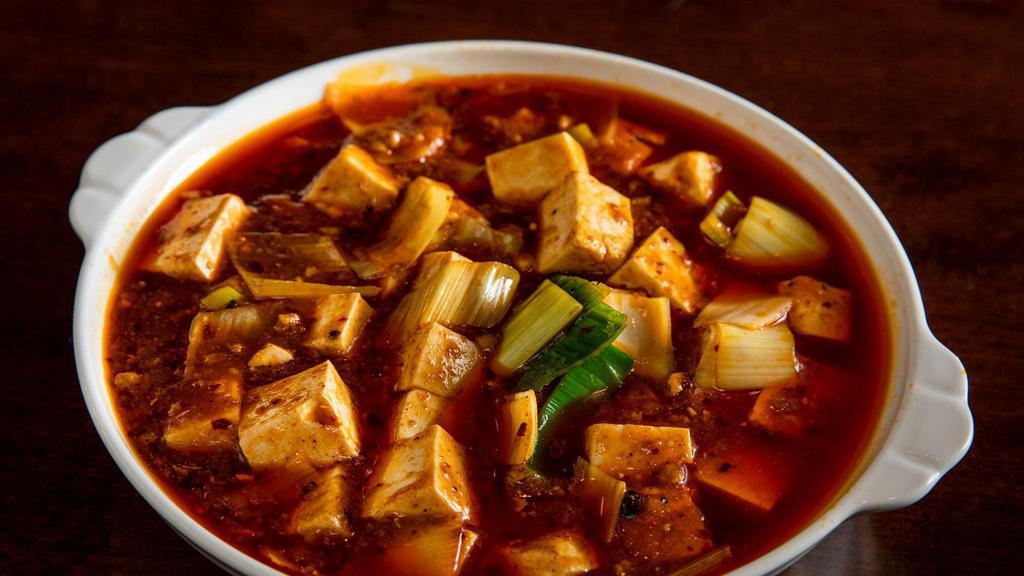 麻婆豆腐 Mapo Tofu (Vegetarian) · Spice level 7/10. Soft Tofu in a chili oil based sauce. Contains leeks. Served with rice. V