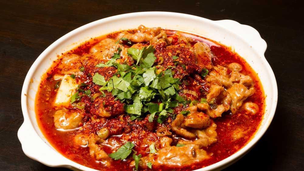 水煮牛 Hot Sauce Beef (Lunch) · Spice level 7/10. Stir-fried with beef, cabbage, garlic, and celery in an authentic Sichuan chili oil hot sauce. Served with white rice.